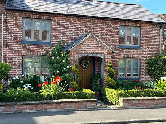Brick house after pointing work.